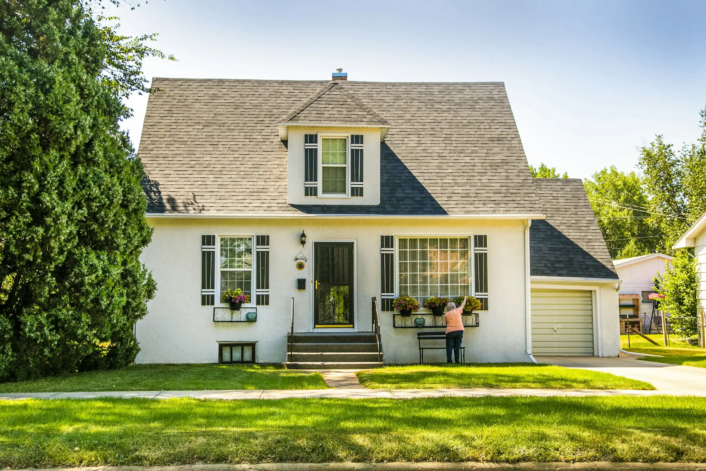 Suburban home with clean exterior windows in bright summer sunlight